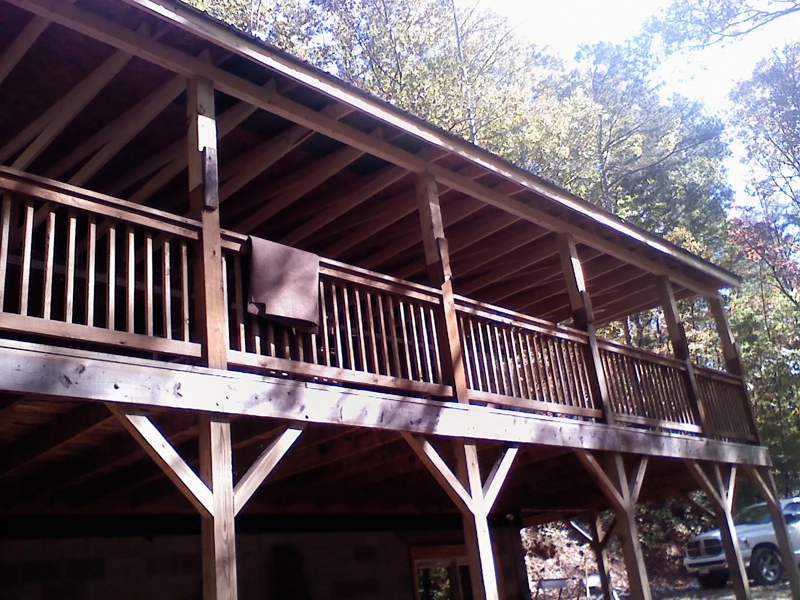 Timber framing under a new elevated porch and deck — Roof Leak Repair in Uvalde by Roofing Brothers